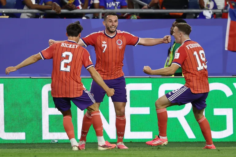 Aston Villa player McGinn scores for Scotland vs Haiti